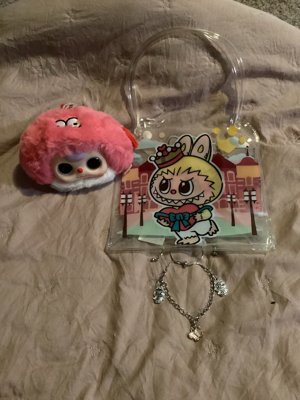 cute keychain smells like strawberry. Handmade charm bracelet and labubu bag.